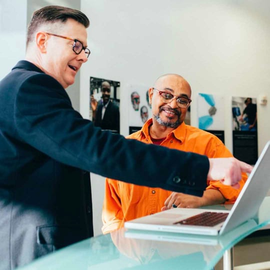 Two men happy at work